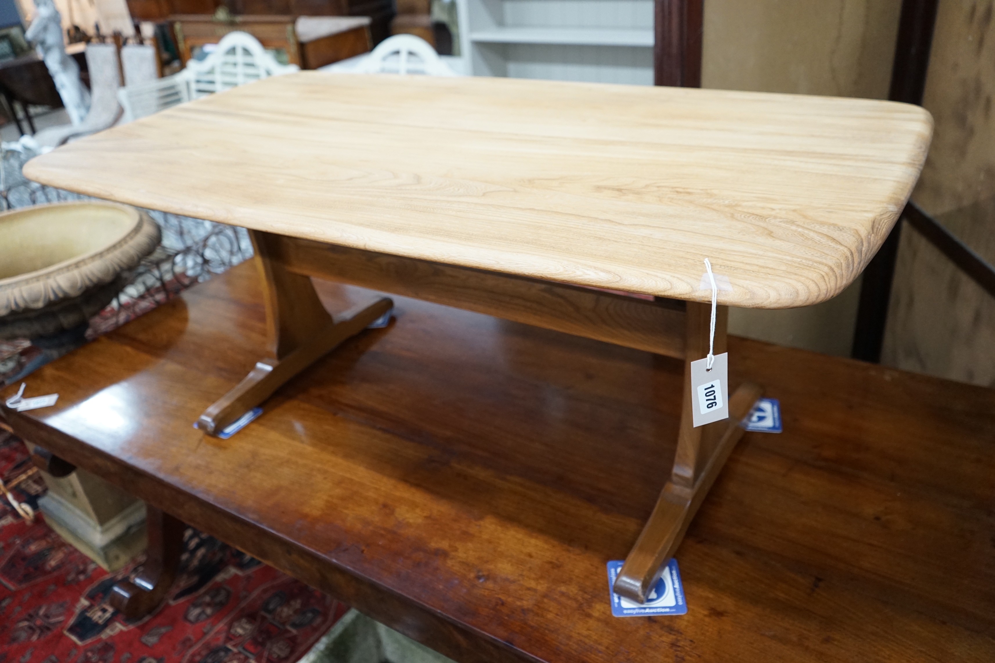 An Ercol light elm rectangular coffee table, length 126cm, depth 69cm, height 52cm